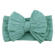 Carregar imagem no visualizador da galeria, Vincha con relieve y moño