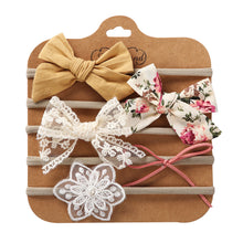Cargar imagen en el visor de la galería, Pack de 5 vinchas con moños y flores