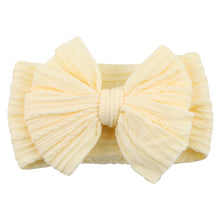 Carregar imagem no visualizador da galeria, Vincha con relieve y moño