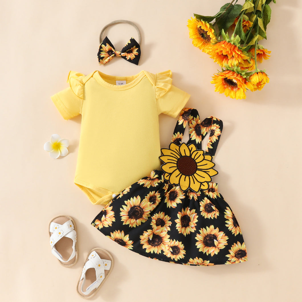 Body amarillo y pollera con tirante de girasoles con vincha