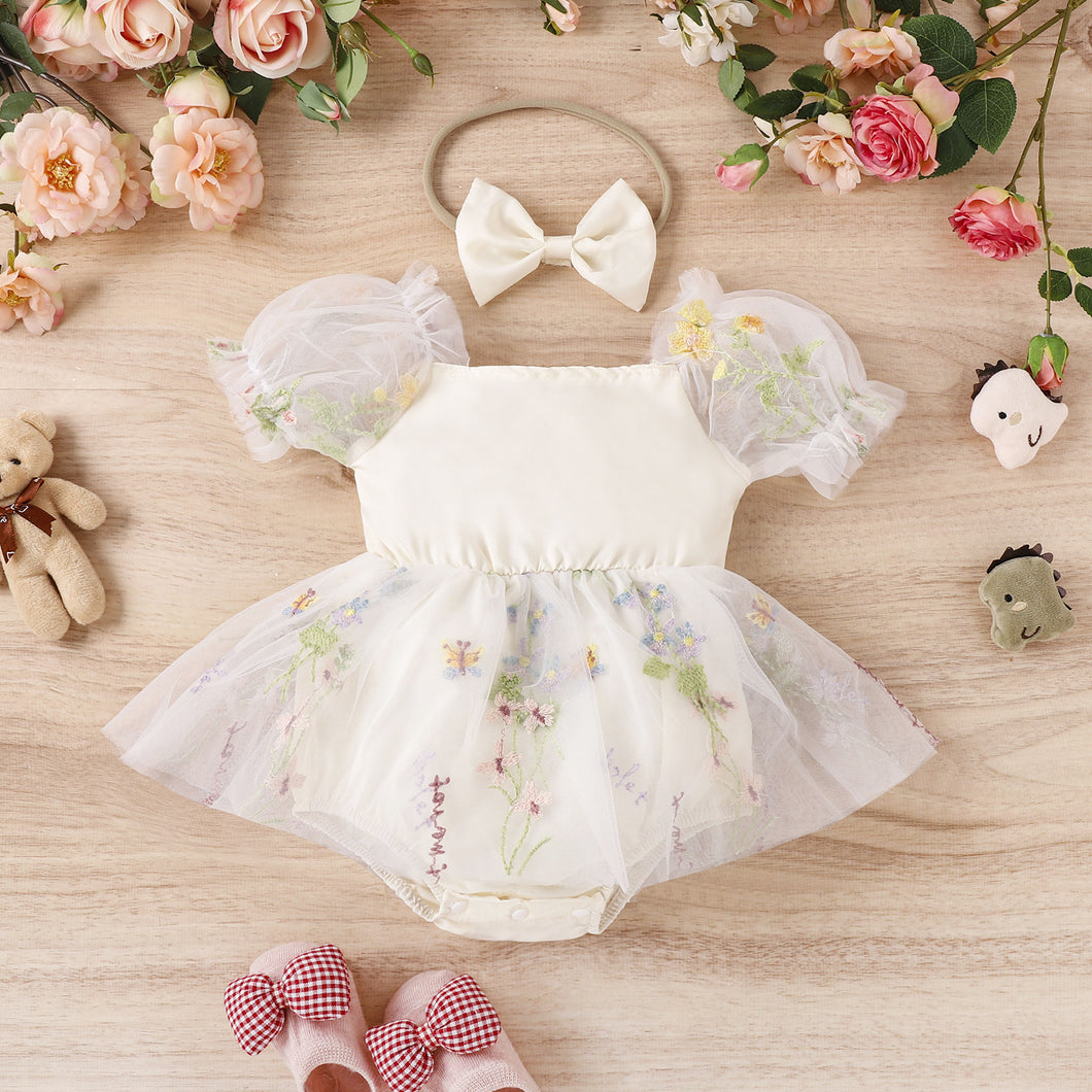 Body vestido crema de tul, bordados de flores mangas abullonadas y vincha