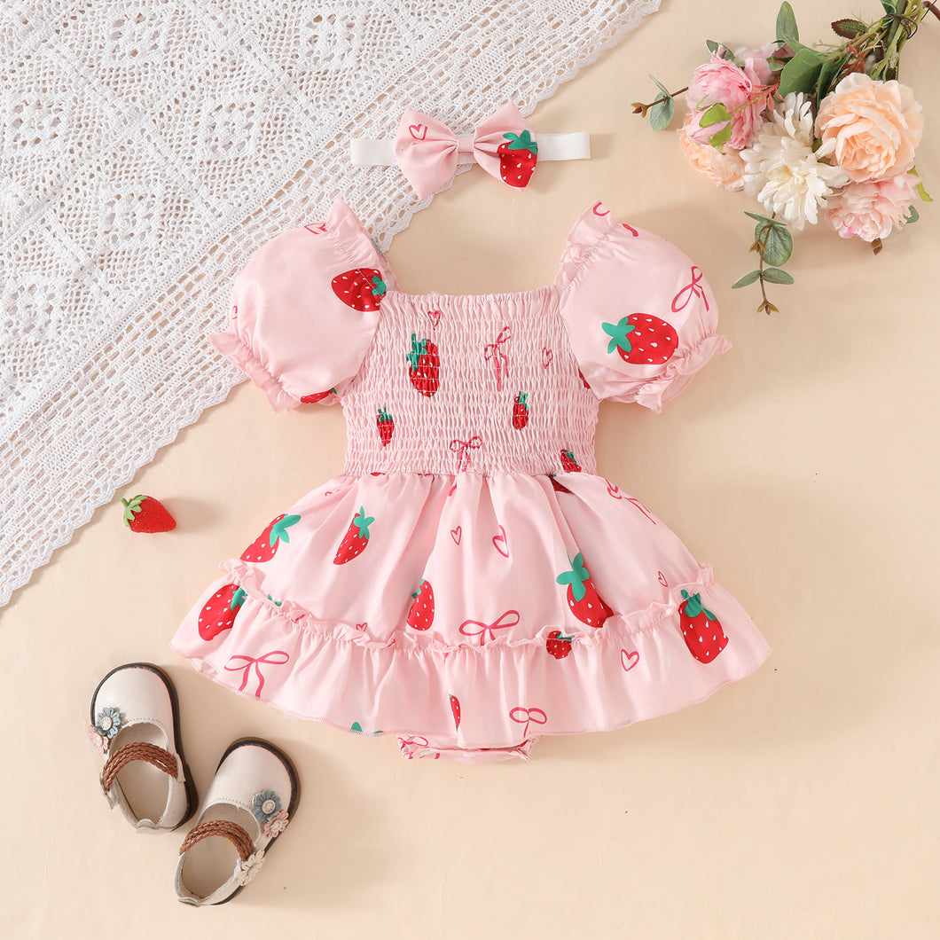 Body vestido engomado rosa con estampas de frutillas y vincha