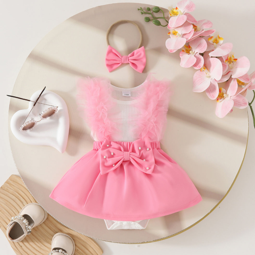 Body vestido blanco, detalles de tul con falda rosa y vincha