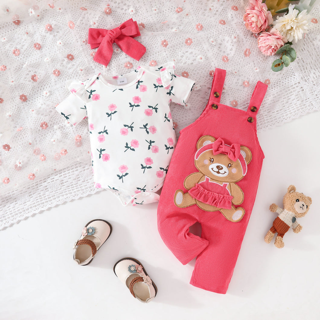 Body blanco con estampas y jardinera coral de oso con vincha