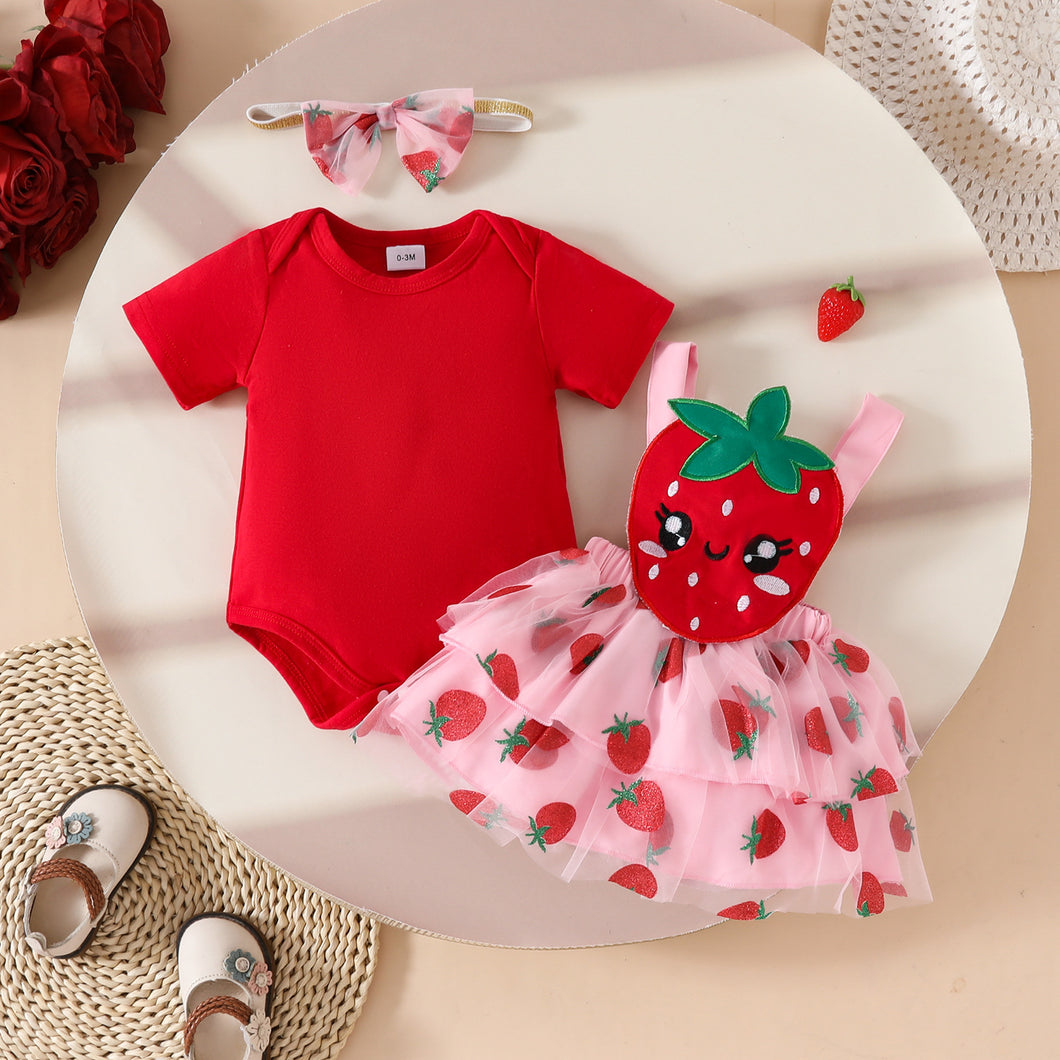 Body rojo, pollera rosa de frutillas con brillo, tirantes y vincha
