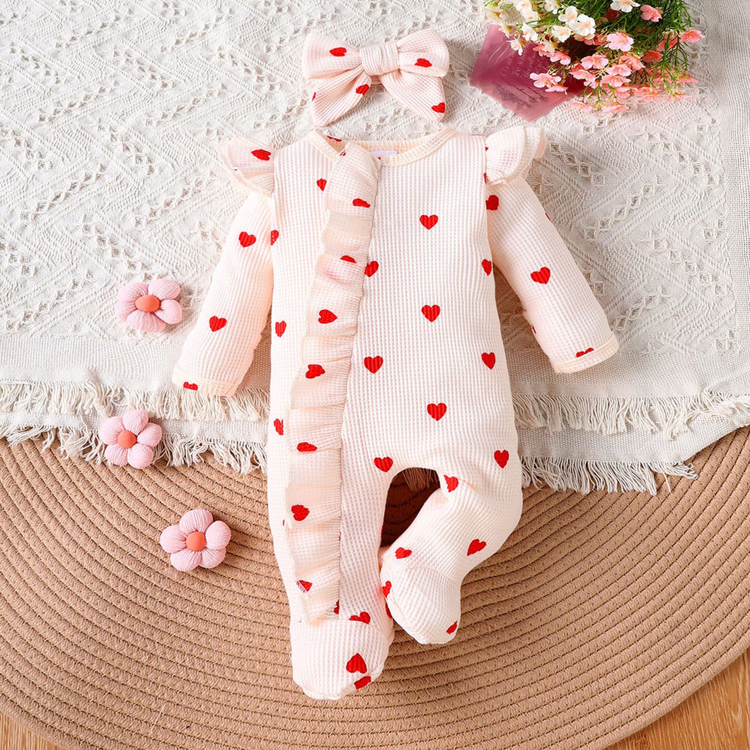 Body osito con volados y estampas de corazones con vincha