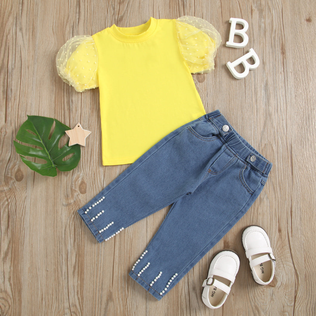 Blusa con mangas de tul abullonadas y capri con detalles de perlas