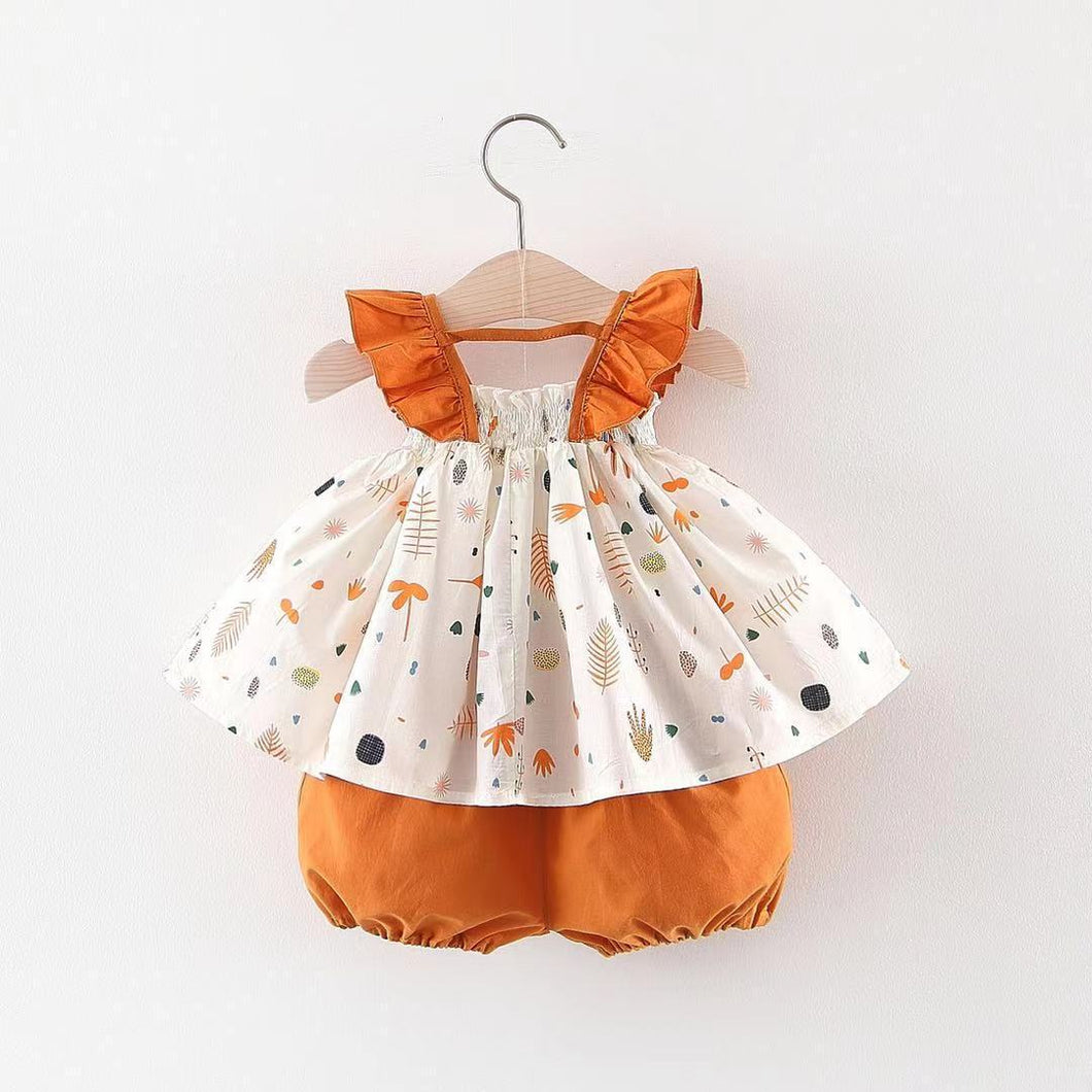Blusa con volados con estampas de hojas y short