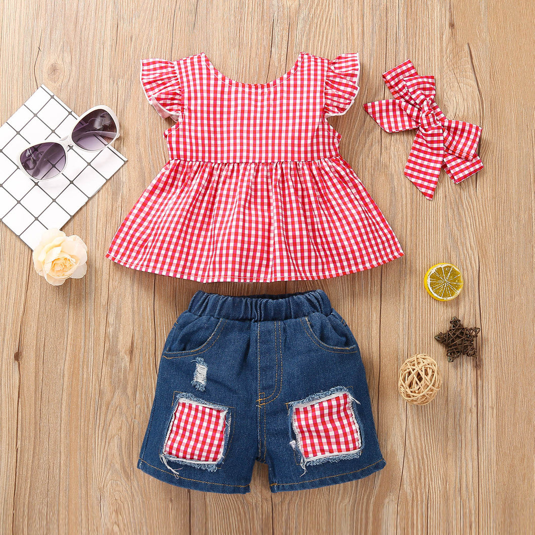 Blusa cuadrille rojo y short jeans rasgado con vincha