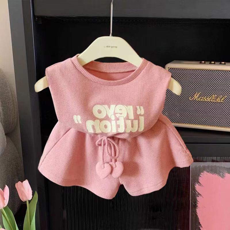 Blusa con letras y short rosa viejo