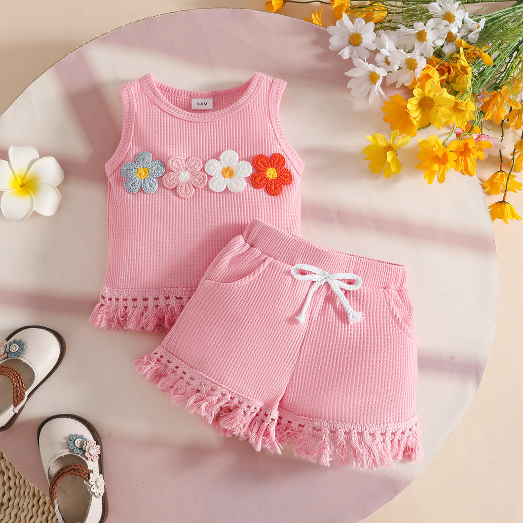Blusa con flores y short con flecos