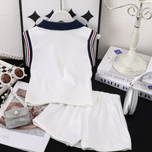 Cargar imagen en el visor de la galería, Blusa con cuello, bordados y short pollera blanco detalles de botones

