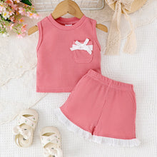 Carregar imagem no visualizador da galeria, Blusa con moño y short rosa con volados en blanco
