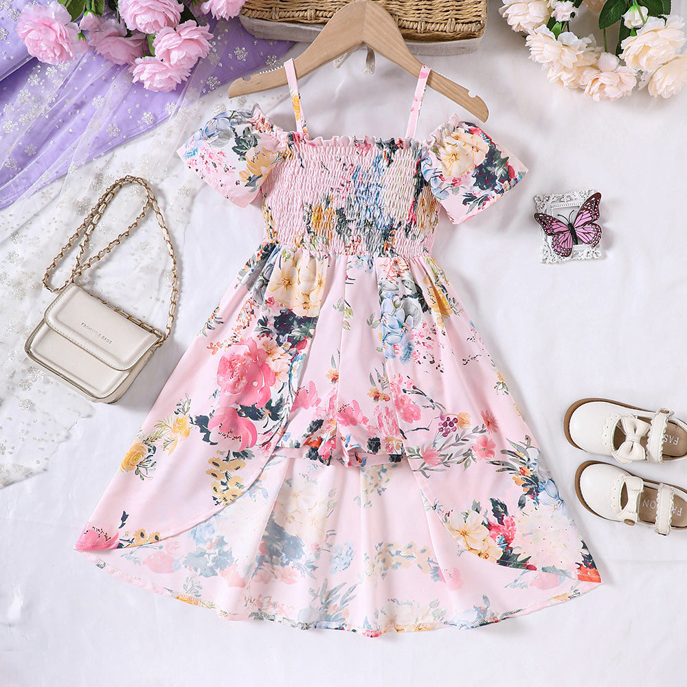 Enterizo rosa con estampas de flores y falda con abertura
