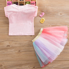 Cargar imagen en el visor de la galería, Remera rosa con estampas de unicornio y pollera tipo tutu colorido de tul
