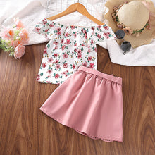 Cargar imagen en el visor de la galería, Blusa blanca floreado y pollera rosa con cinto
