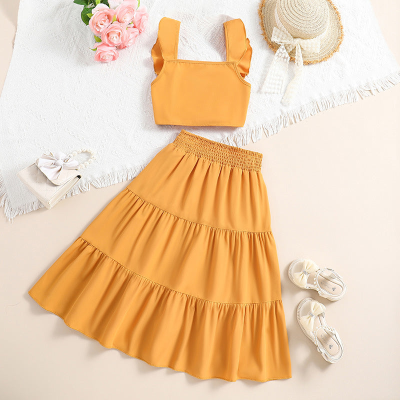 Crop top engomado y pollera escalonado mostaza