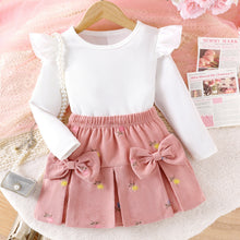 Cargar imagen en el visor de la galería, Blusa blanca con volados y pollera rosa viejo con moños y flores
