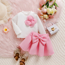 Cargar imagen en el visor de la galería, Blusa blanca con flor y pollera rosa con moño
