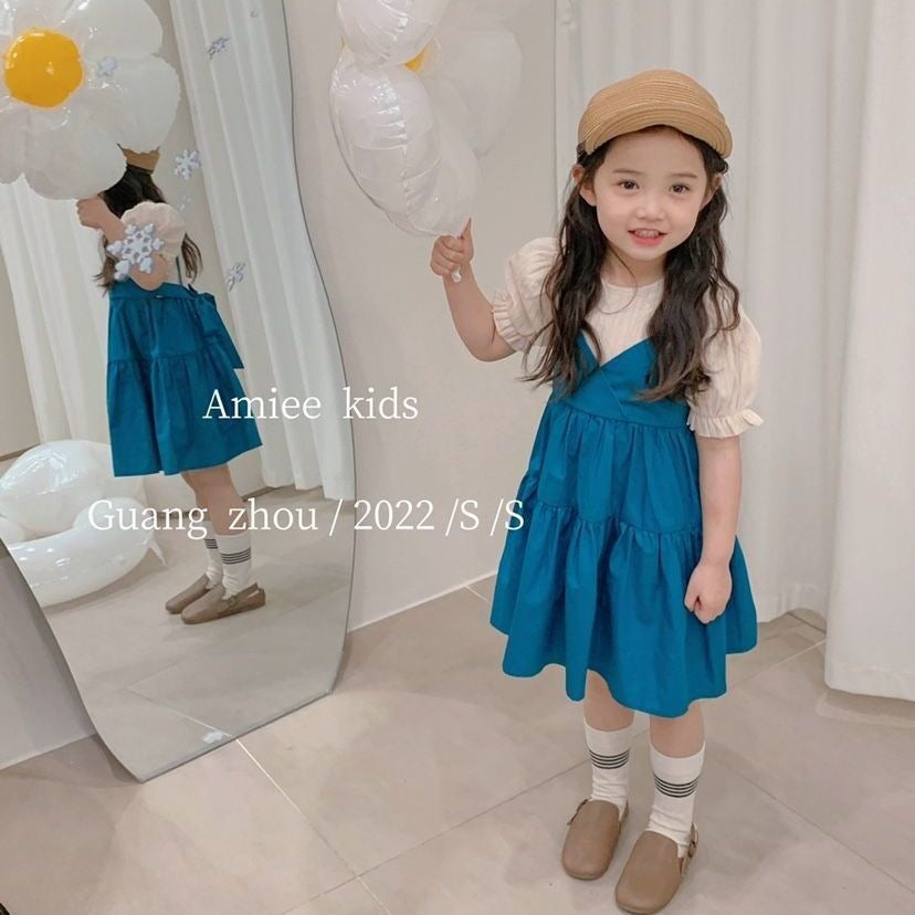 Vestido doble color con mangas abullonadas