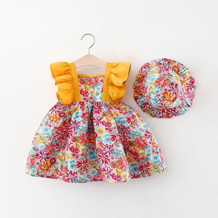 Vestido con estampas de flores, espalda semi abierta con volados