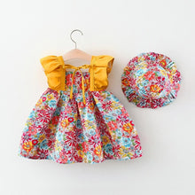 Cargar imagen en el visor de la galería, Vestido con estampas de flores, espalda semi abierta con volados
