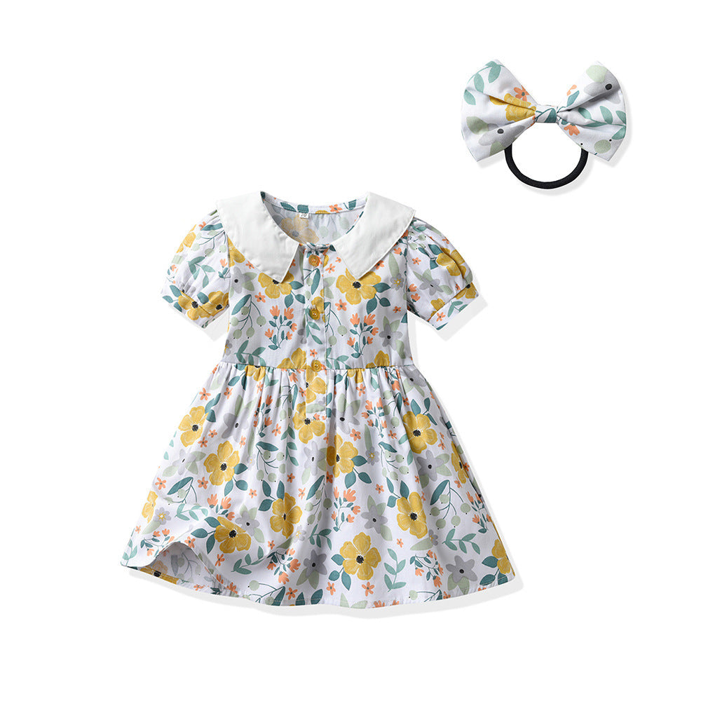 Vestido blanco con estampas de flores y agogo