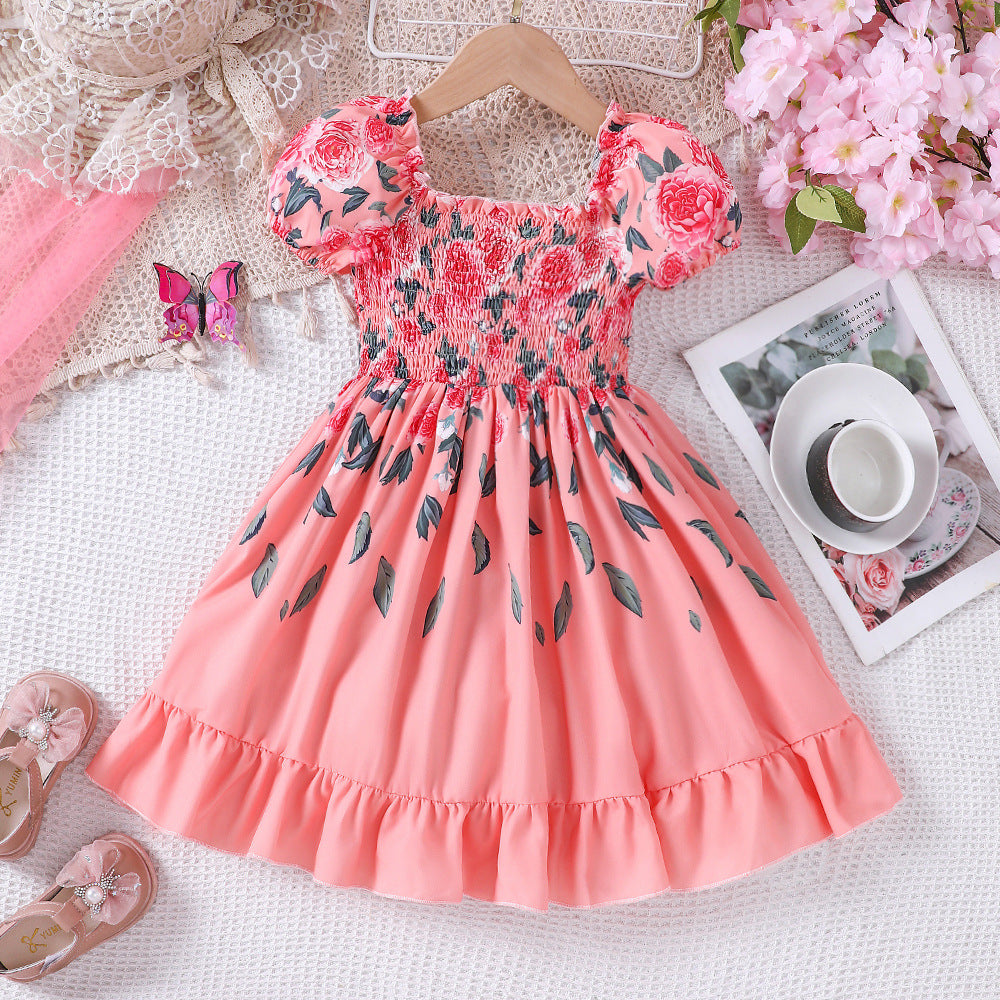 Vestido engomado salmón  con estampas de flores y mangas abullonadas