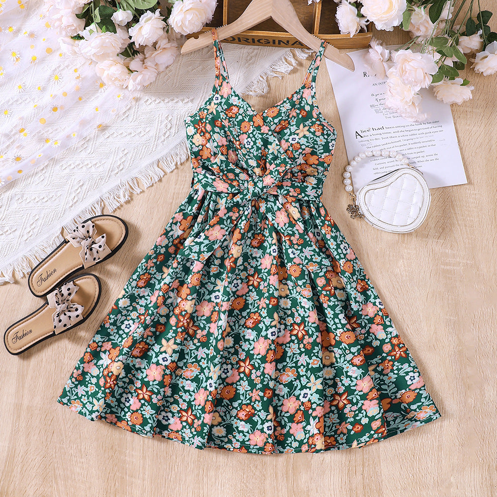 Vestido verde con estampas de flores y cinto