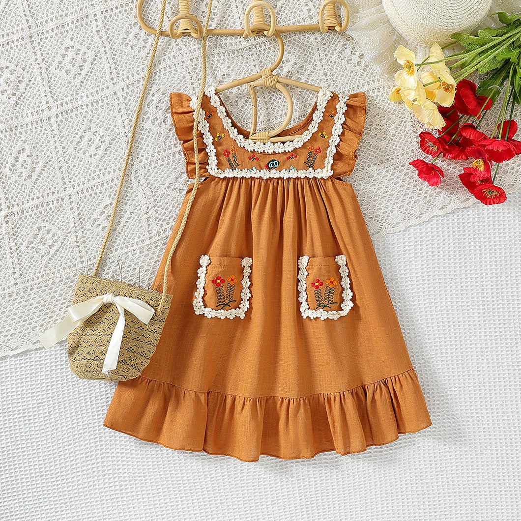 Vestido con bordados de flores y volados