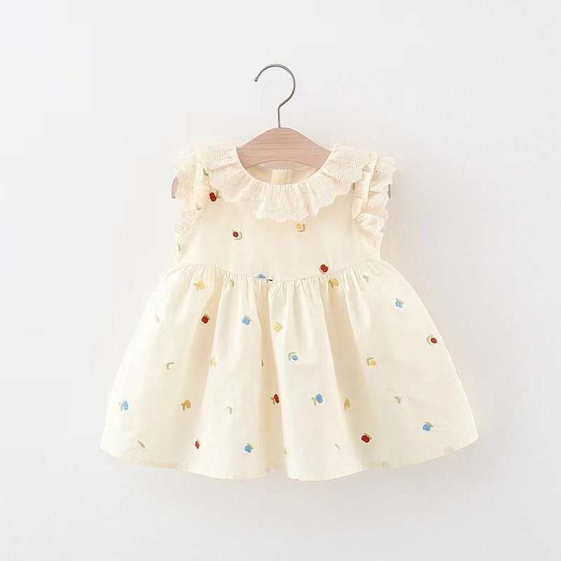 Vestido crema con volados y bordados de flores
