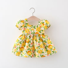 Carregar imagem no visualizador da galeria, Vestido con estampas de flores, mangas abullonadas y moño
