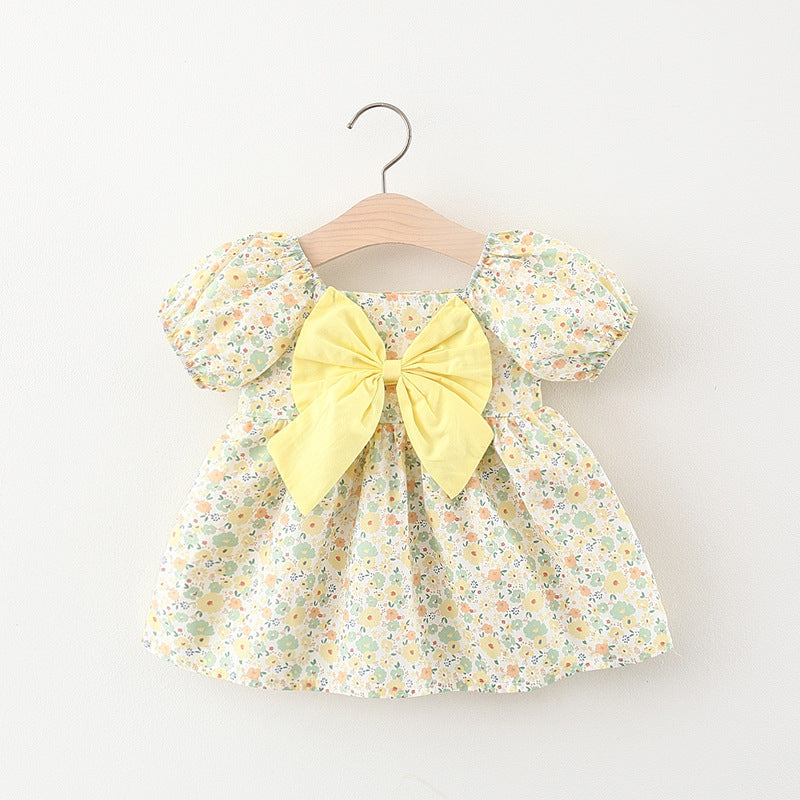 Vestido con estampas de flores, mangas abullonadas y moño