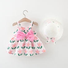 Carregar imagem no visualizador da galeria, Vestido con estampas de flores, moño y sombrero
