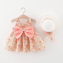 Carregar imagem no visualizador da galeria, Vestido con estampas de flores, moño y sombrero
