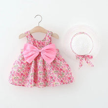 Carregar imagem no visualizador da galeria, Vestido con estampas de flores, moño y sombrero
