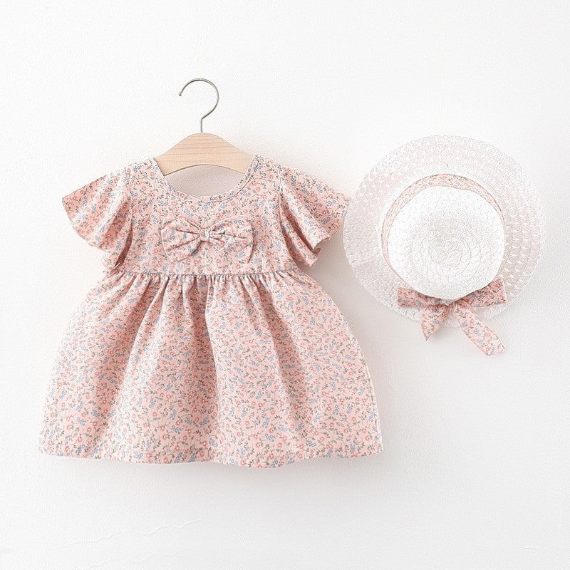 Vestido con estampas de flores y sombrero