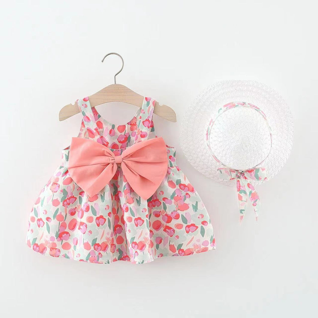 Vestido con estampas de flores y sombrero