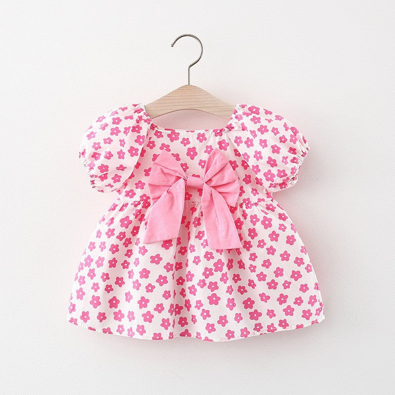 Vestido con estampas de flores, mangas abullonadas y moño