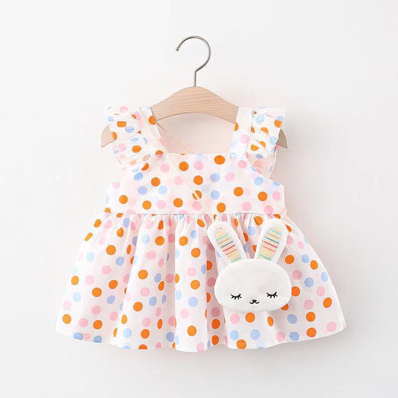 Vestido con motas coloridos, volados y cartera de conejo