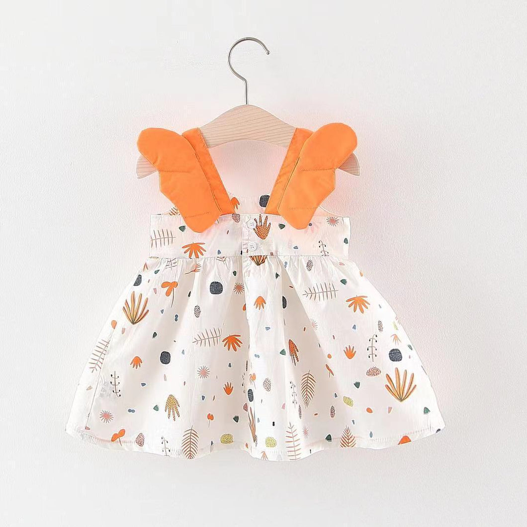 Vestido blanco con estampas y alas