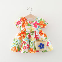 Carregar imagem no visualizador da galeria, Vestido con estampas de flores, mangas abullonadas y cartera
