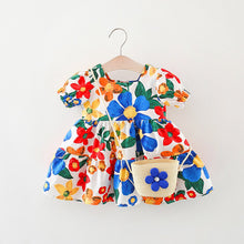 Carregar imagem no visualizador da galeria, Vestido con estampas de flores, mangas abullonadas y cartera

