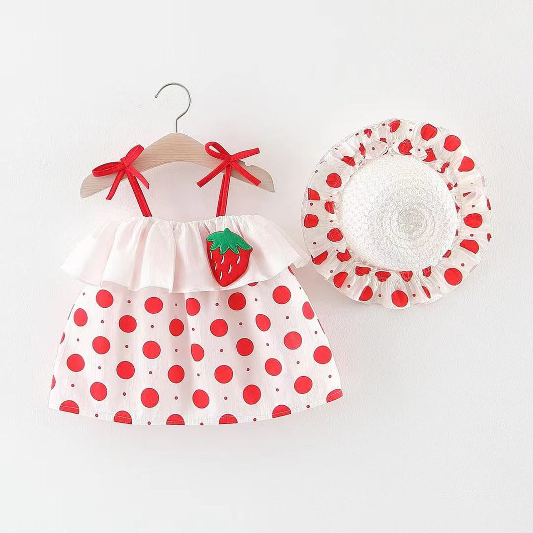 Vestido blanco de frutilla, con motas rojas y sombrero