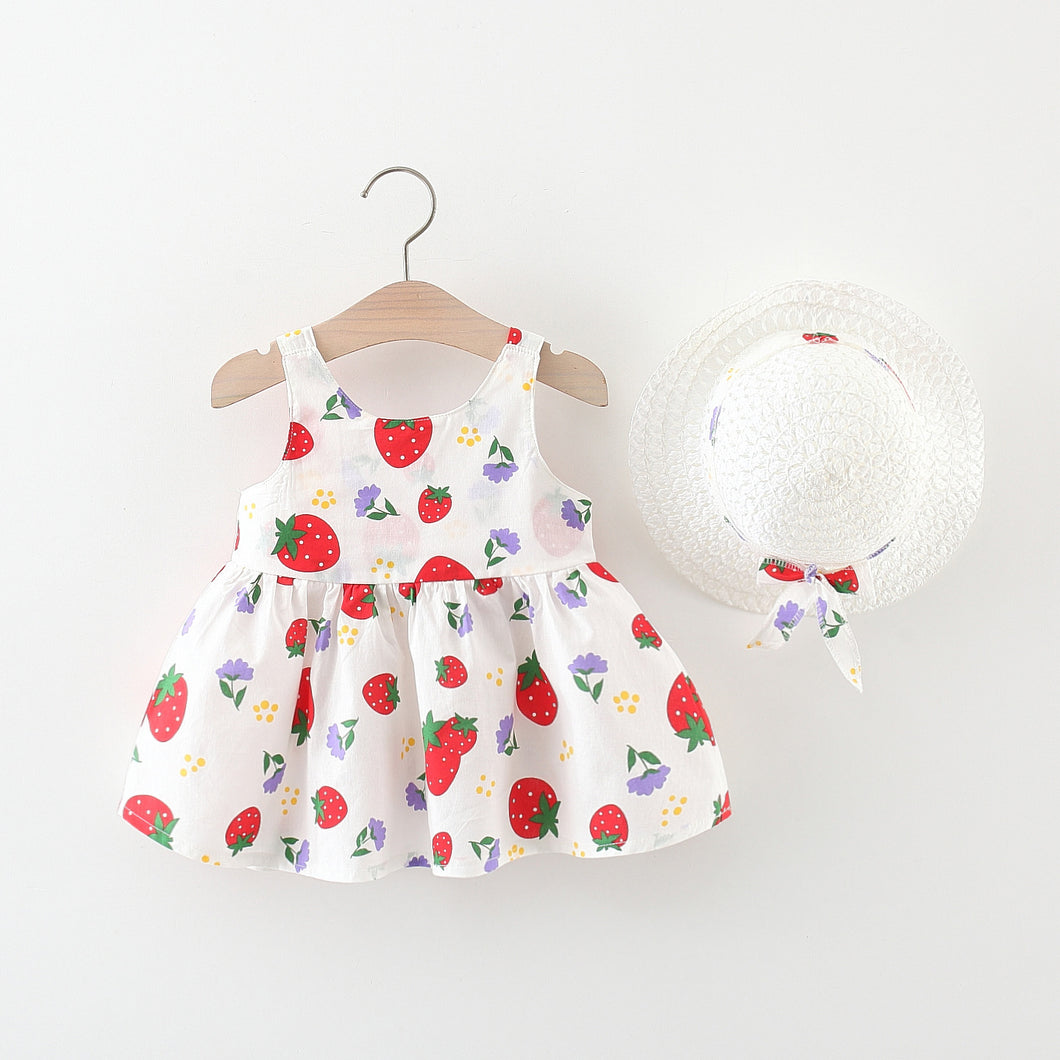 Vestido blanco con estampas de frutillas, moño y sombrero
