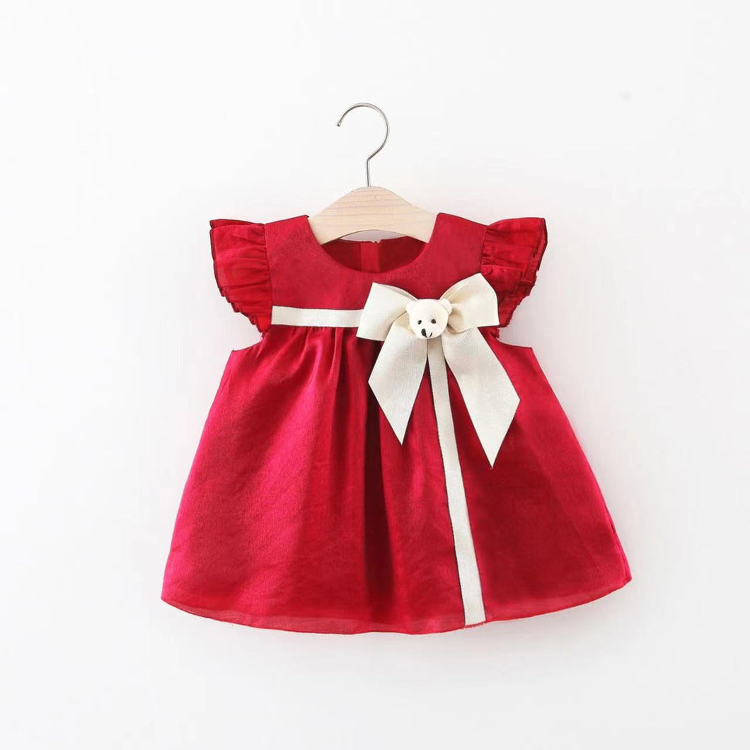 Vestido bordo con volados, detalles y moño crema