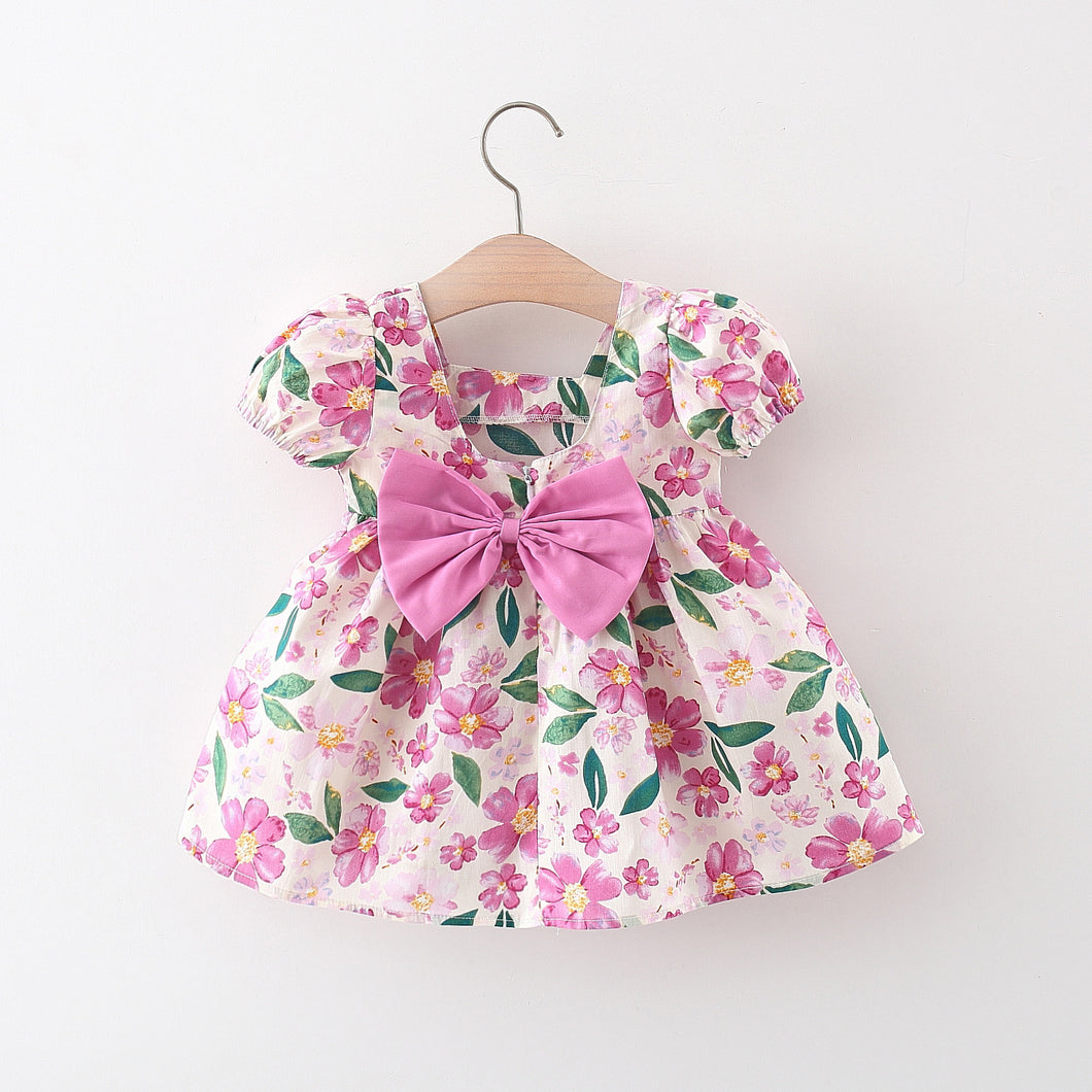 Vestido con estampas de flores, mangas abullonadas y moño