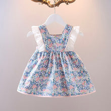 Carregar imagem no visualizador da galeria, Vestido con estampas de flores, volados blanco y moño rosa
