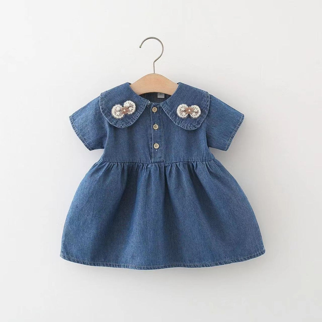 Vestido jeans con detalles de moño y botones