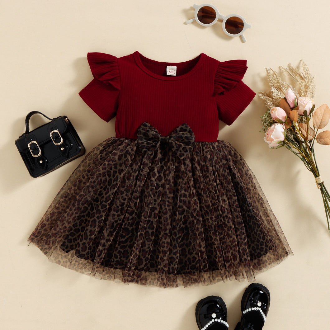 Vestido bordo acanalado con bordado y falda de tul animal print